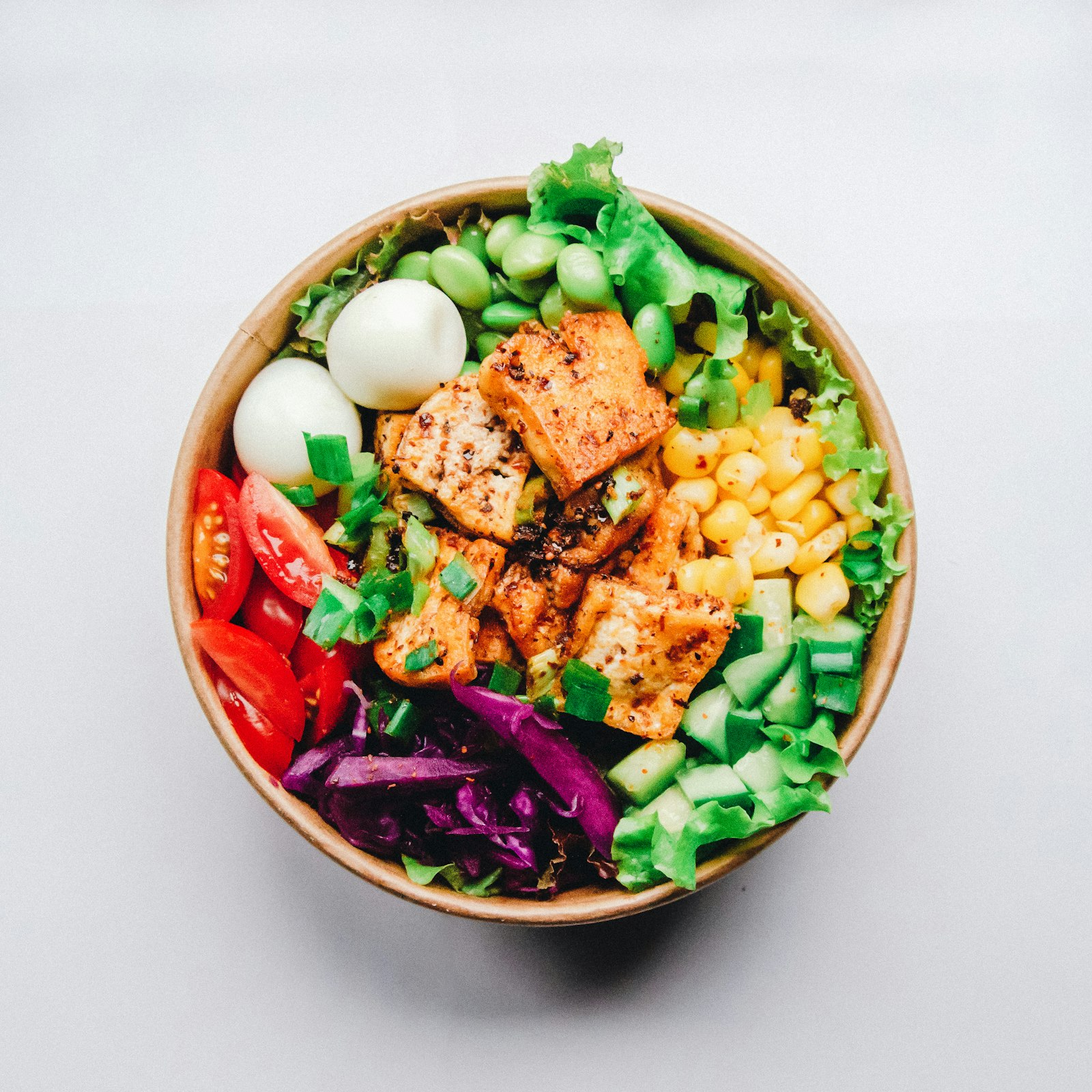 Balanced bowl with fresh vegetables and grains