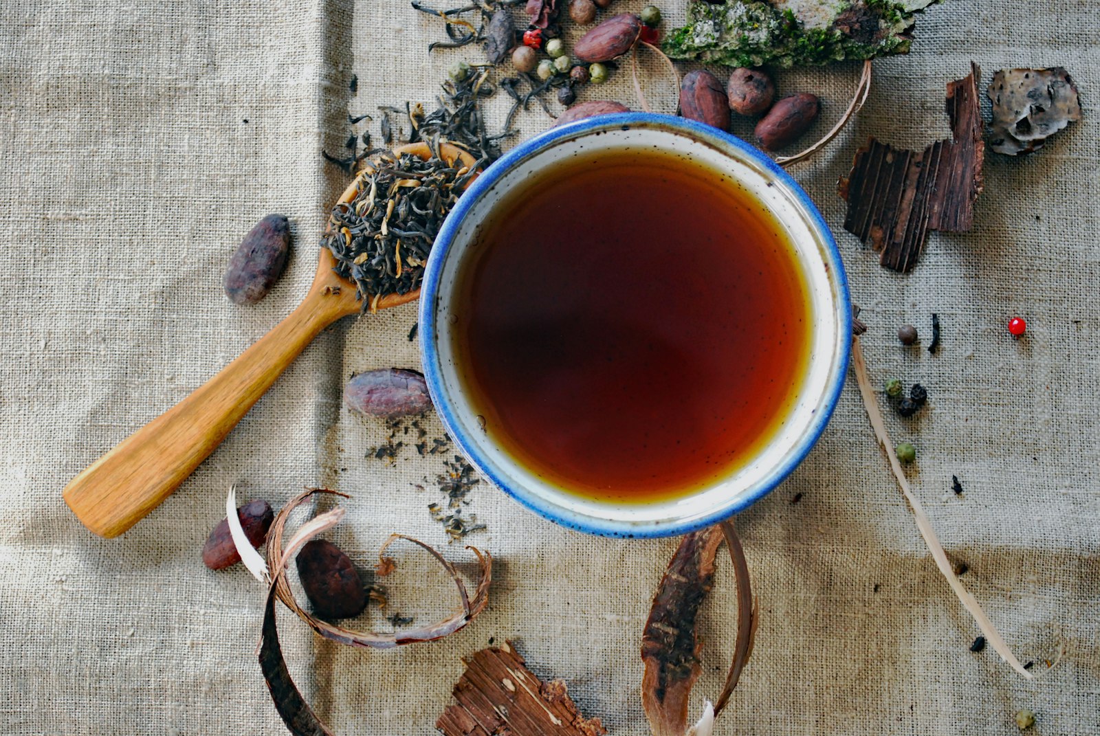 Cup of herbal tea beside a calm morning setup